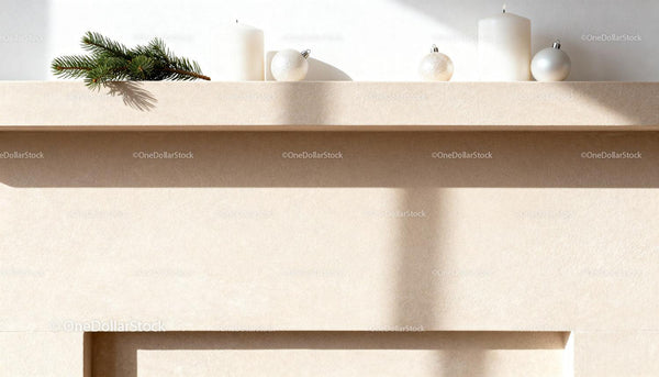 Minimalist holiday mantel with candles and pine branch