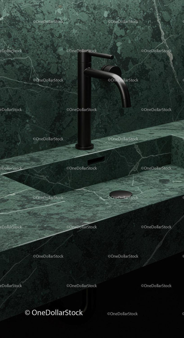 Czarna bateria nad zielonym marmurowym zlewem w eleganckiej nowoczesnej łazience