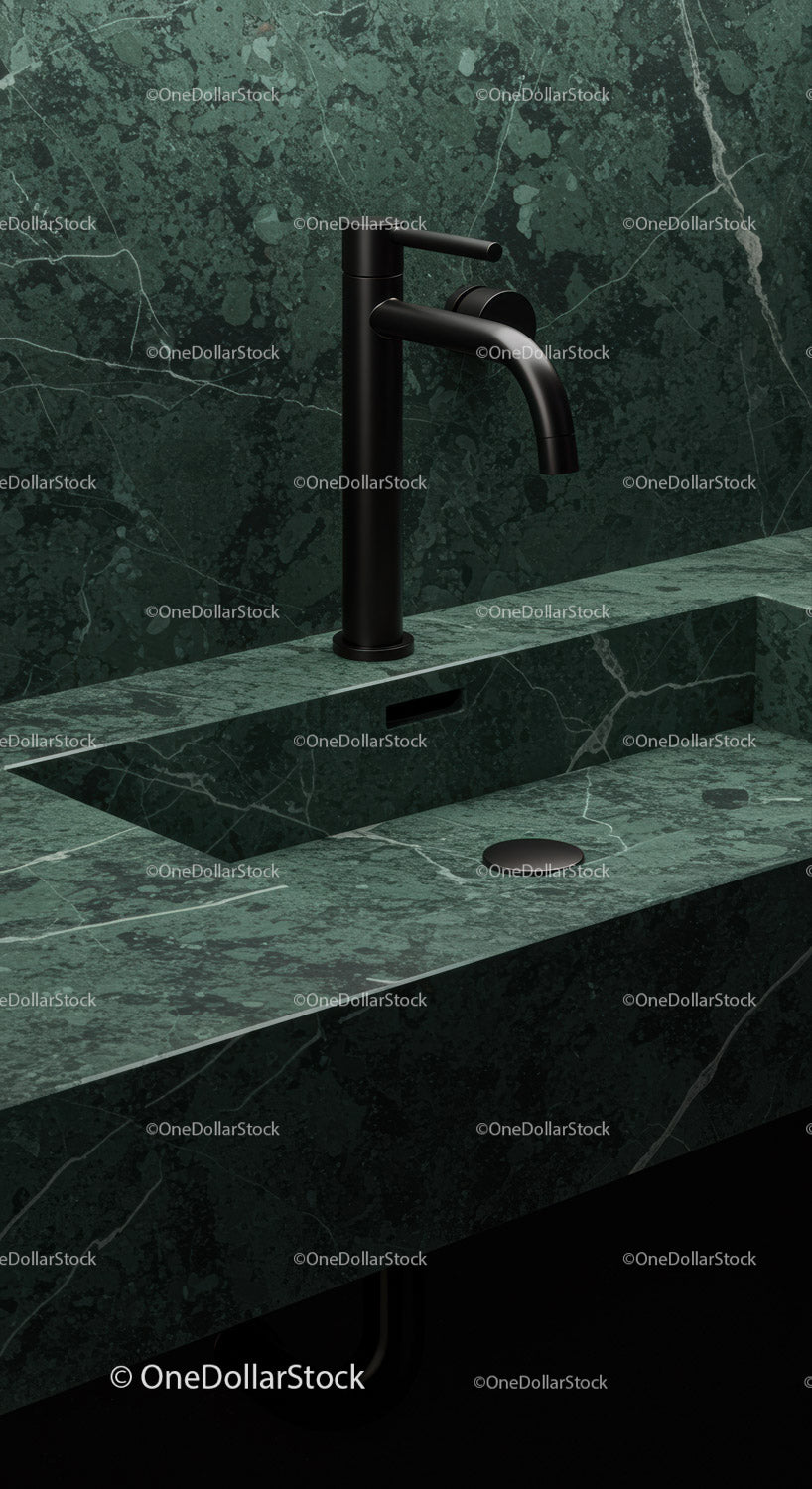 Czarny kran nad zieloną marmurową umywalką w eleganckiej, nowoczesnej łazience