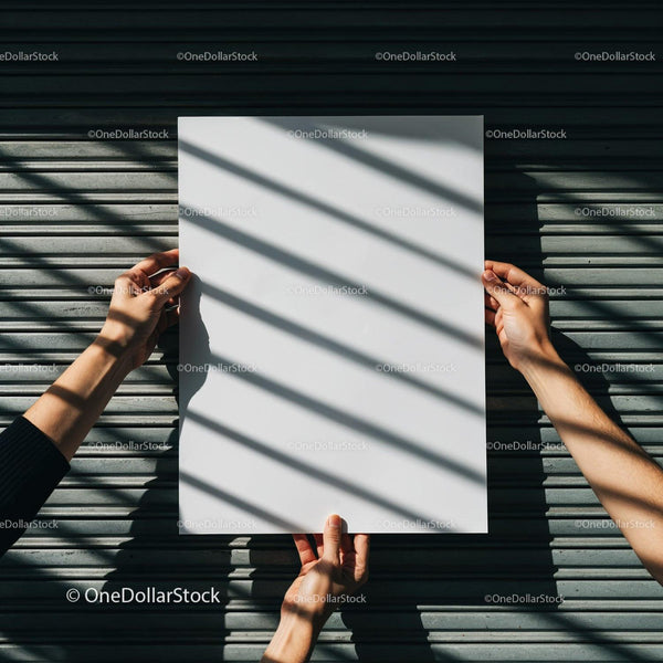 Hands Holding Blank White Poster Against Metal Background JPG Mockup Image