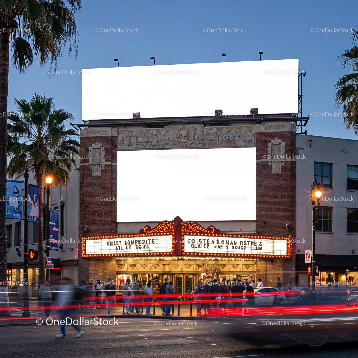 Evening crowd outside vintage theater with bright marquee