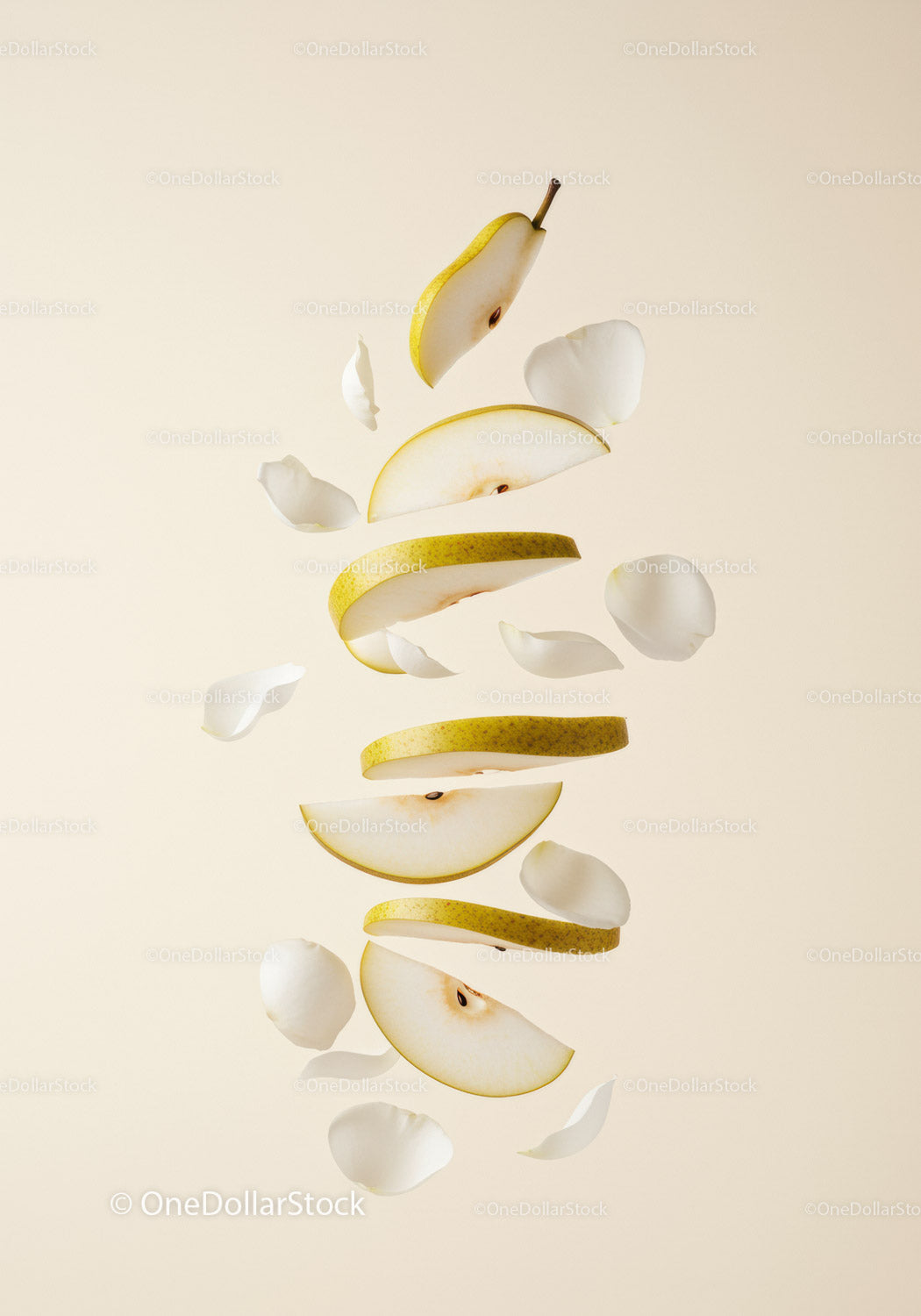 Floating Sliced Pear with White Flower Petals