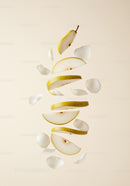 Floating Sliced Pear with White Flower Petals