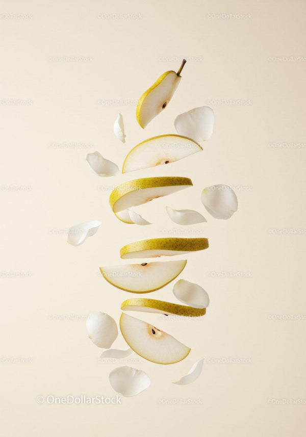 Floating Sliced Pear with White Flower Petals