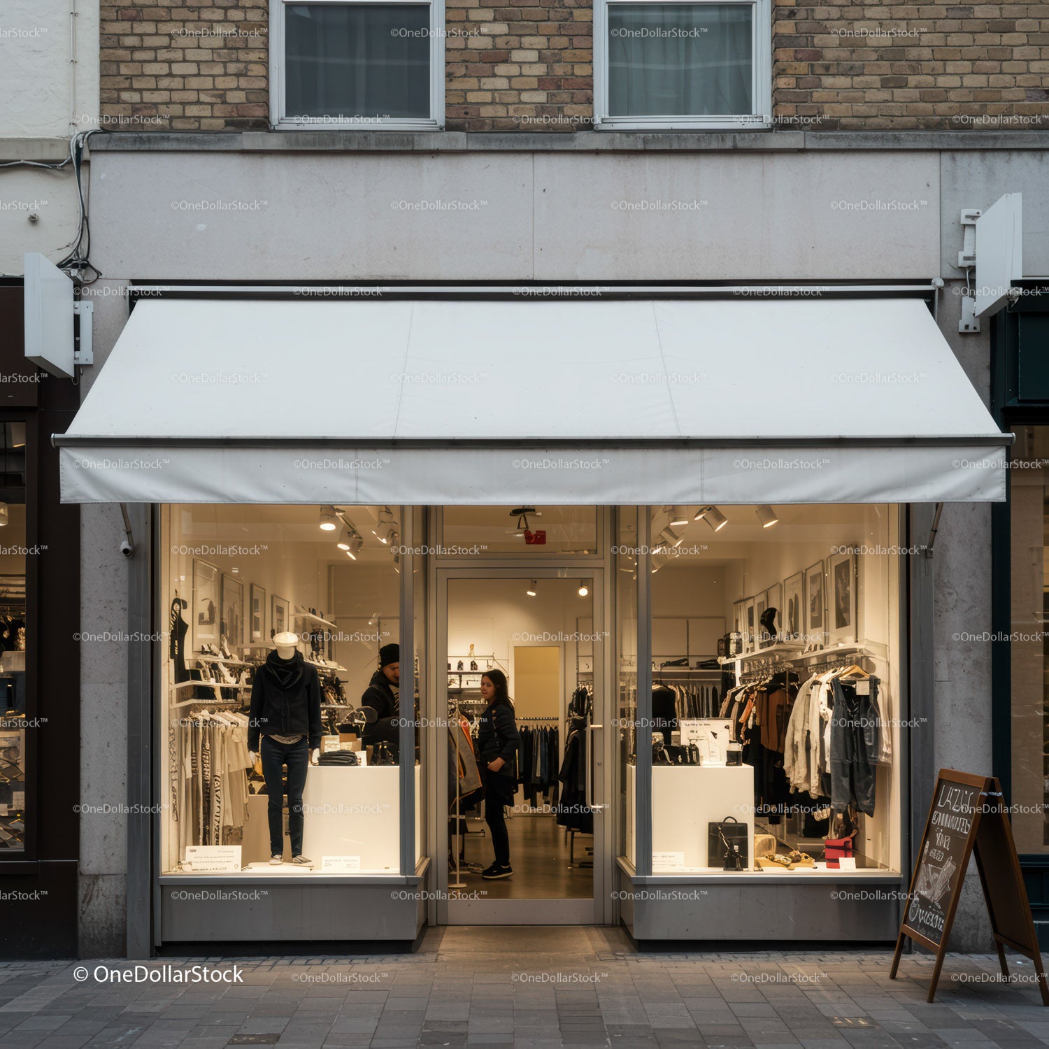 Fashion boutique storefront with customers exploring clothing