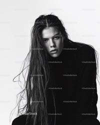 Stylish Black and White Portrait of a Woman with Wet Hair