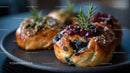 Blueberry Pastries with Red Currants and Herbs in Close-Up