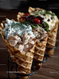 Assorted Fish Salad in Waffle Cones with Fresh Cherry Berries and Greens