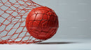Red Soccer Ball in Net on Light Background