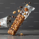 Nut and Chocolate Snack Bar Breaking Apart in Flight