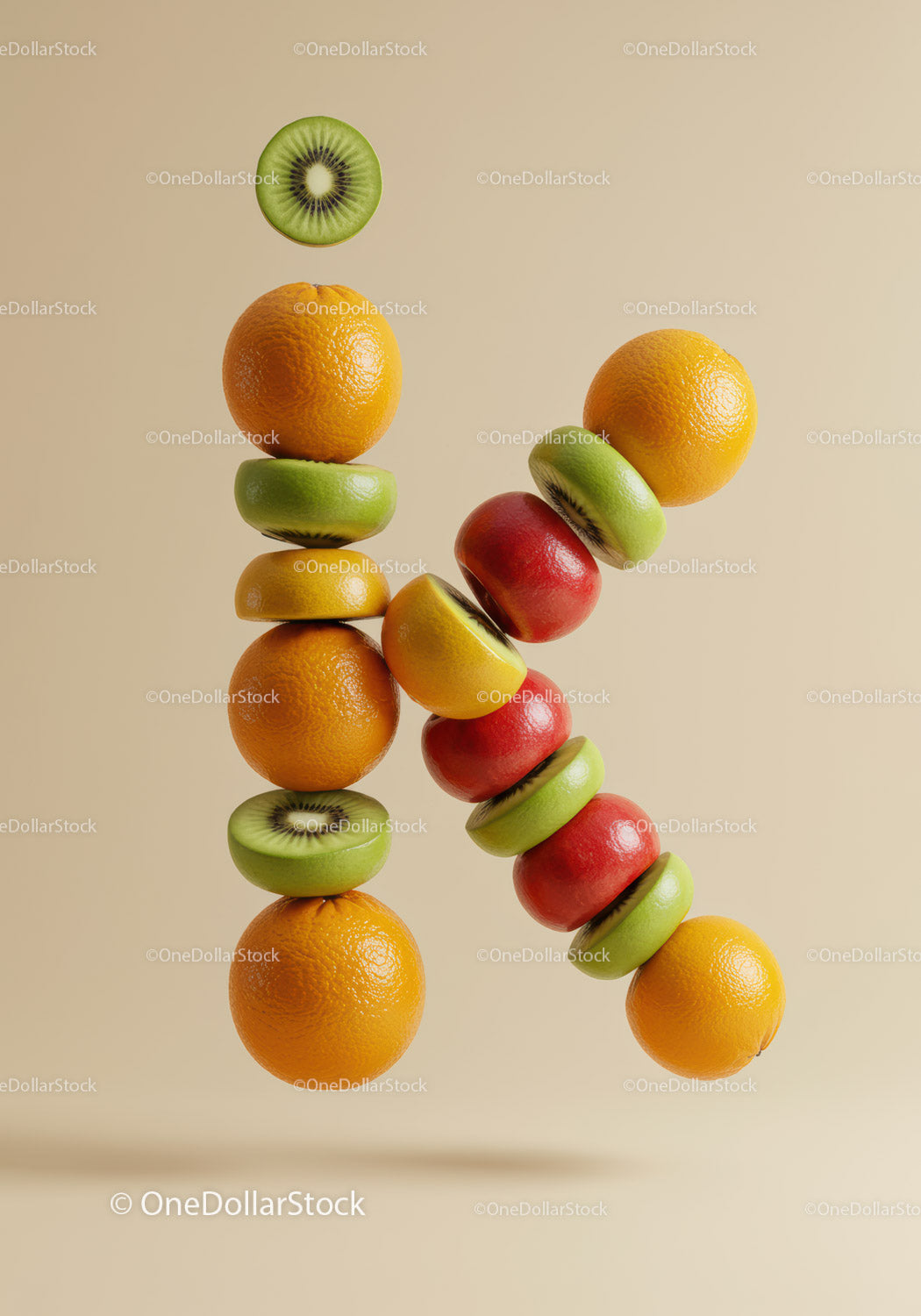 Creative letter K formed with assorted fresh fruits