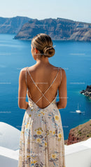 Woman in Floral Dress Overlooking Blue Sea and Cliffs