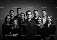Confident diverse young adults posed in black and white