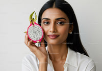 Elegant Woman Holding Fresh Dragon Fruit in Close Up Shot