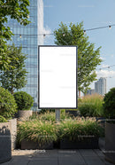 Blank urban billboard surrounded by green plants on terrace