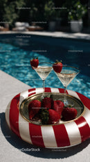 Strawberries and Champagne Glasses by Poolside on Sunny Day