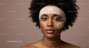 Portrait of Young Woman with Facial Bandages and Natural Curly Hair
