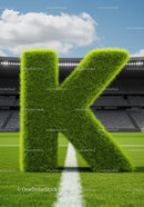 Green Grass Letter K on Football Stadium Field