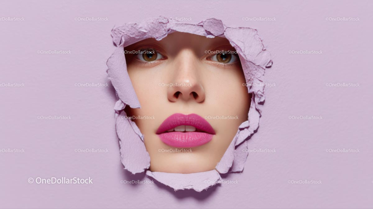 Close-Up Portrait of a Glamorous Model with Pink Lipstick