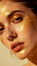 Close-up of young woman with golden facial mask