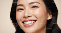 Close up of joyful woman smiling with flawless skin