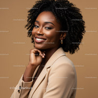 Elegant Woman with Curly Hair in Beige Blazer Portrait