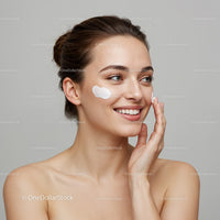 Young Woman Applying Facial Cream for Skincare Routine