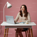 Smiling Woman Using Laptop in Modern Home Office Setup