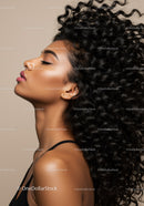 Side Profile of Woman with Voluminous Curly Hair
