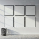Minimalist empty square frames on white wall