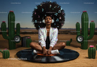 Woman with headphones meditating on vinyl record in desert