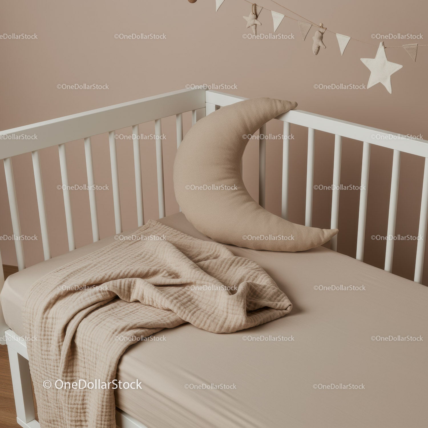 Minimalist baby crib with soft moon pillow and blanket