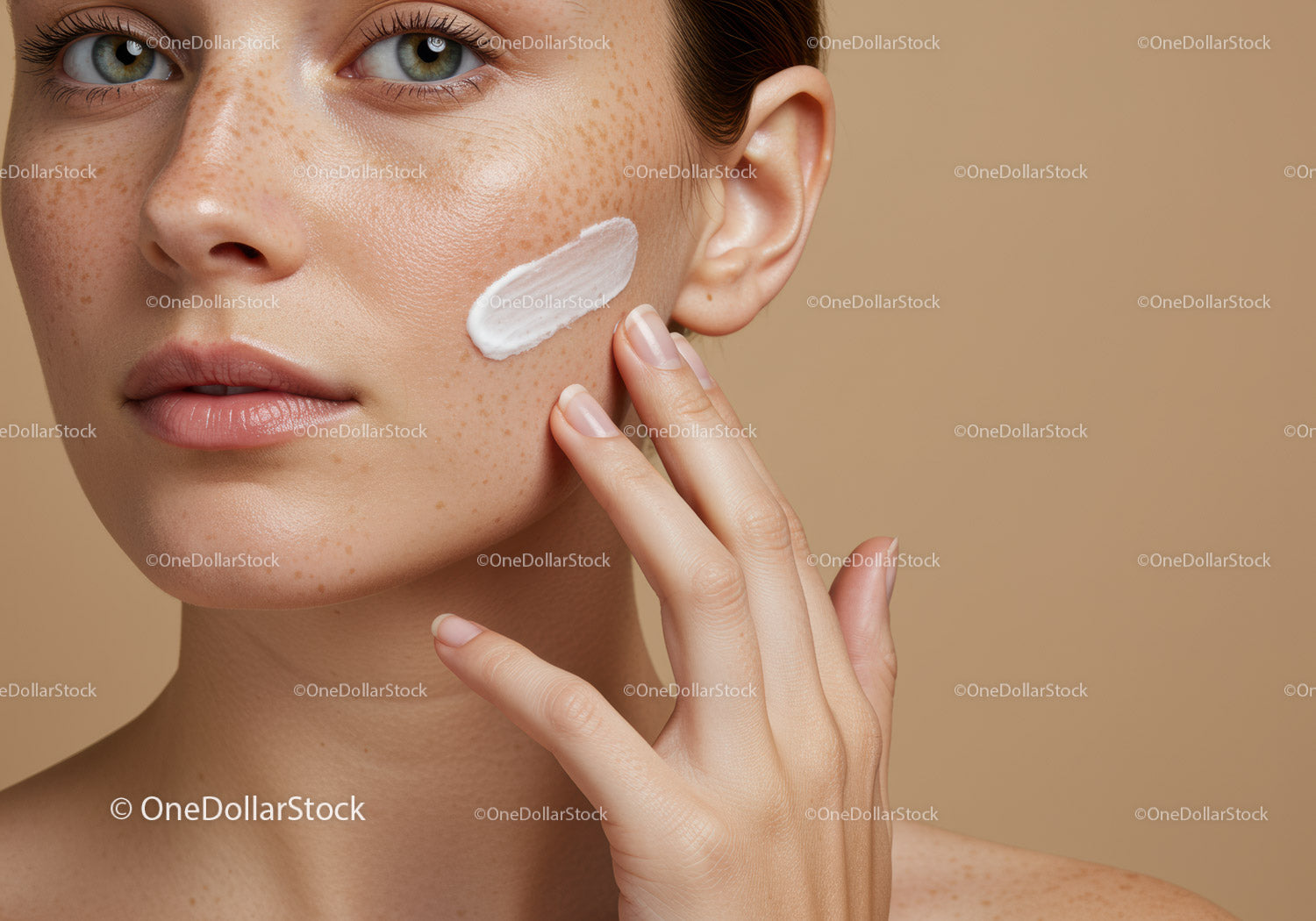 Close-Up of Freckled Woman Applying Skincare on Face