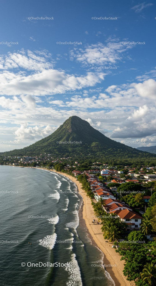 Tropical Mountain and Beach Scene with Coastal Village and Ocean Waves