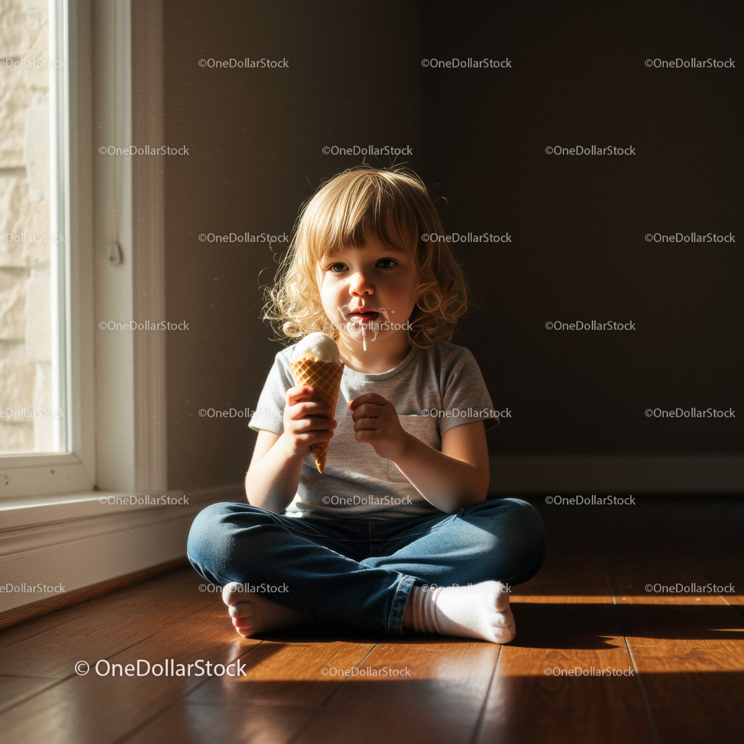 Little child enjoying melting ice cream indoors
