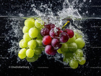 Fresh Green and Red Grapes Splashing in Water with Dynamic Movement