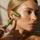 Close-Up of Woman Using Jade Roller for Facial Rejuvenation