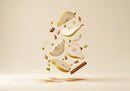 Fresh pear slices with spices and pistachios floating