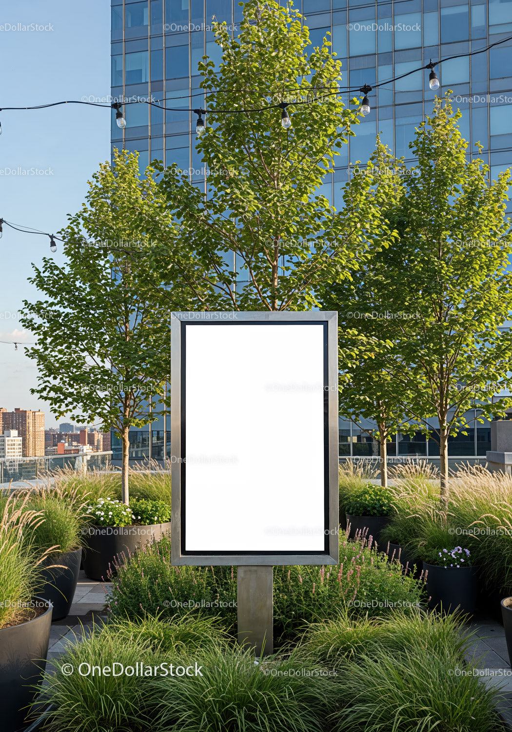 Blank vertical advertising board in urban garden setting