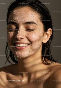 Young Woman Smiling with Glowing Skin and Natural Beauty