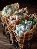Fresh Waffle Cones Filled with Creamy Cheese and Cherry Tomatoes
