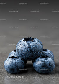 Close up of fresh blueberries with water droplets