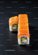Fresh salmon sushi rolls with avocado and cream cheese