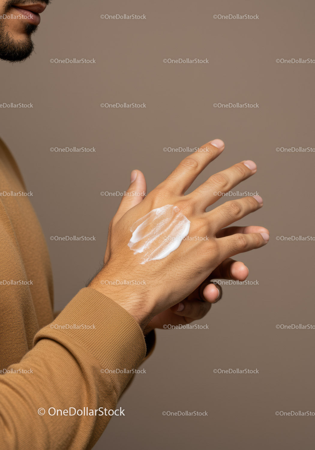 Close-Up of a Man Applying Hand Lotion for Skin Care