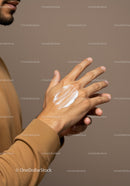 Close-Up of a Man Applying Hand Lotion for Skin Care