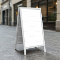 Blank White A-Frame Sign on Urban Sidewalk