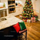 Christmas decorated kitchen with festive tree and gifts