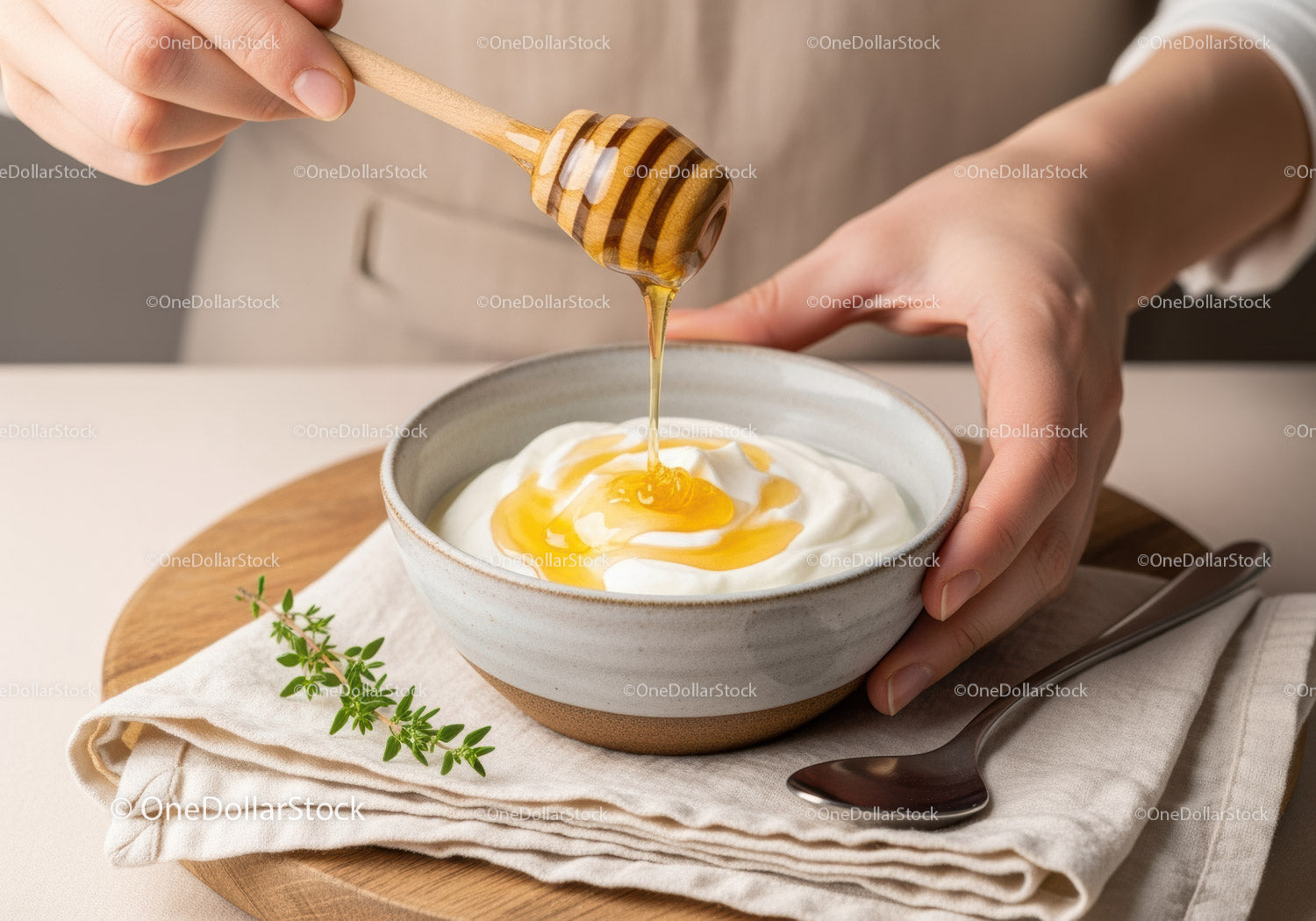 Creamy Yogurt Bowl with Honey Drizzle and Fresh Herbs