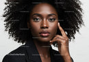 Elegant African American Woman with Curly Hair and Beautiful Makeup