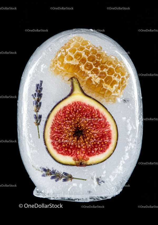 Frozen fig slice with honeycomb and lavender sprigs